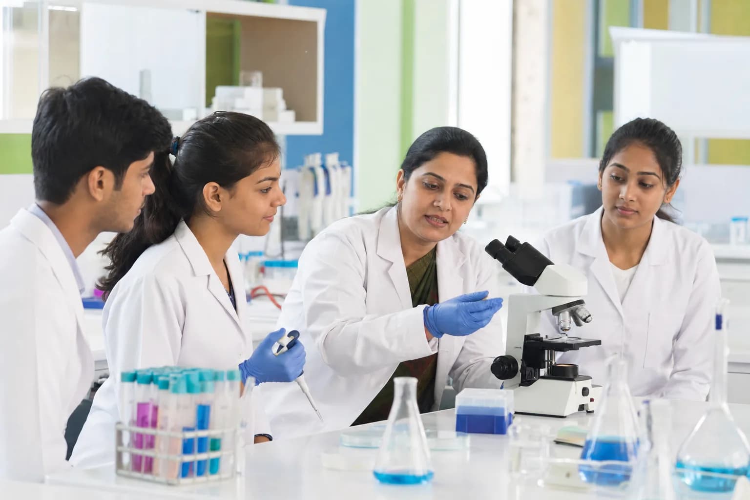 Indian biotechnology students receiving practical laboratory training